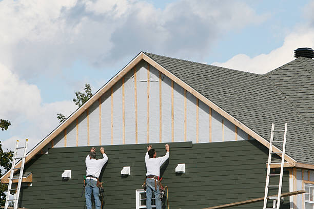 Professional Siding Replacement technician working in Baden, MD